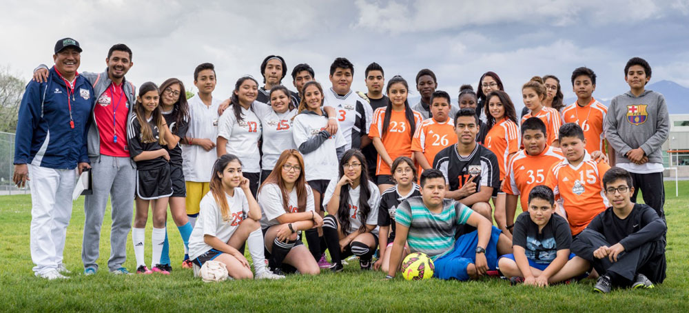 Group photo of Hartland Soccer Club players and coaches