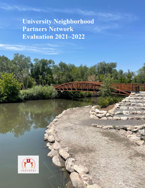 Report cover with picture of river and bridge surrounded by trees